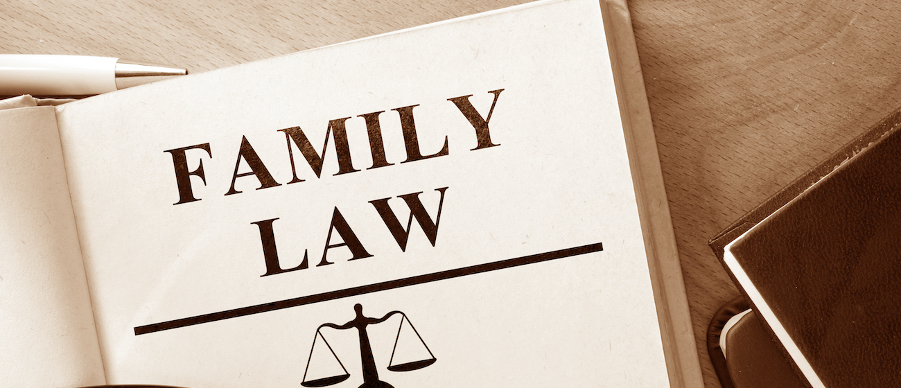 Code of family law on a wooden table.