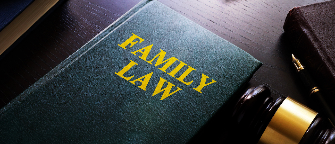 Family law on a table. Child custody and divorce concept.