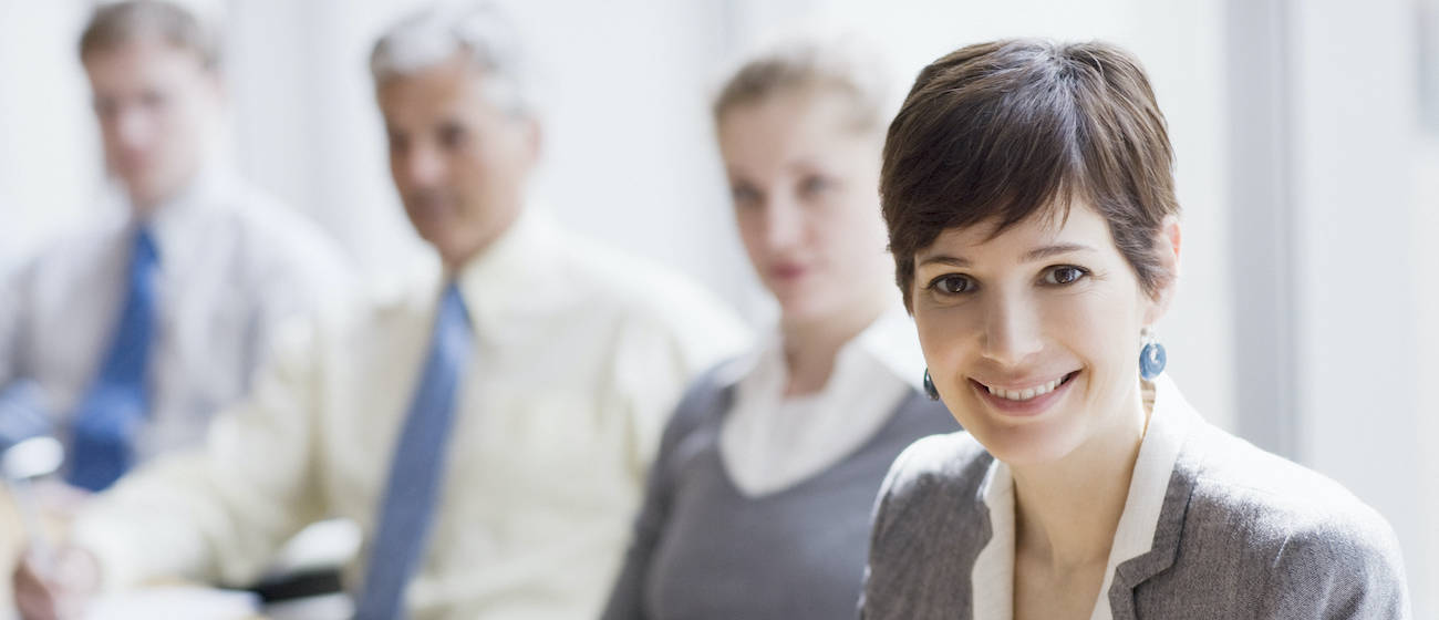 Smiling businesswoman in conference room